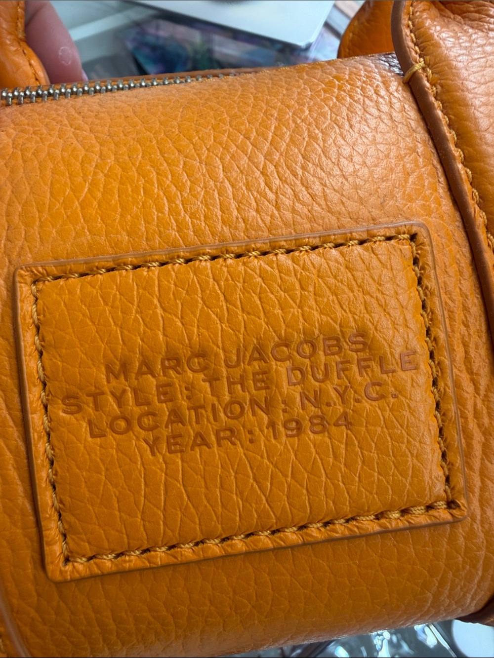 Marc Jacobs Mini Duffle Bag in Bright Orange Pebbled Leather - Picture 5 of 10